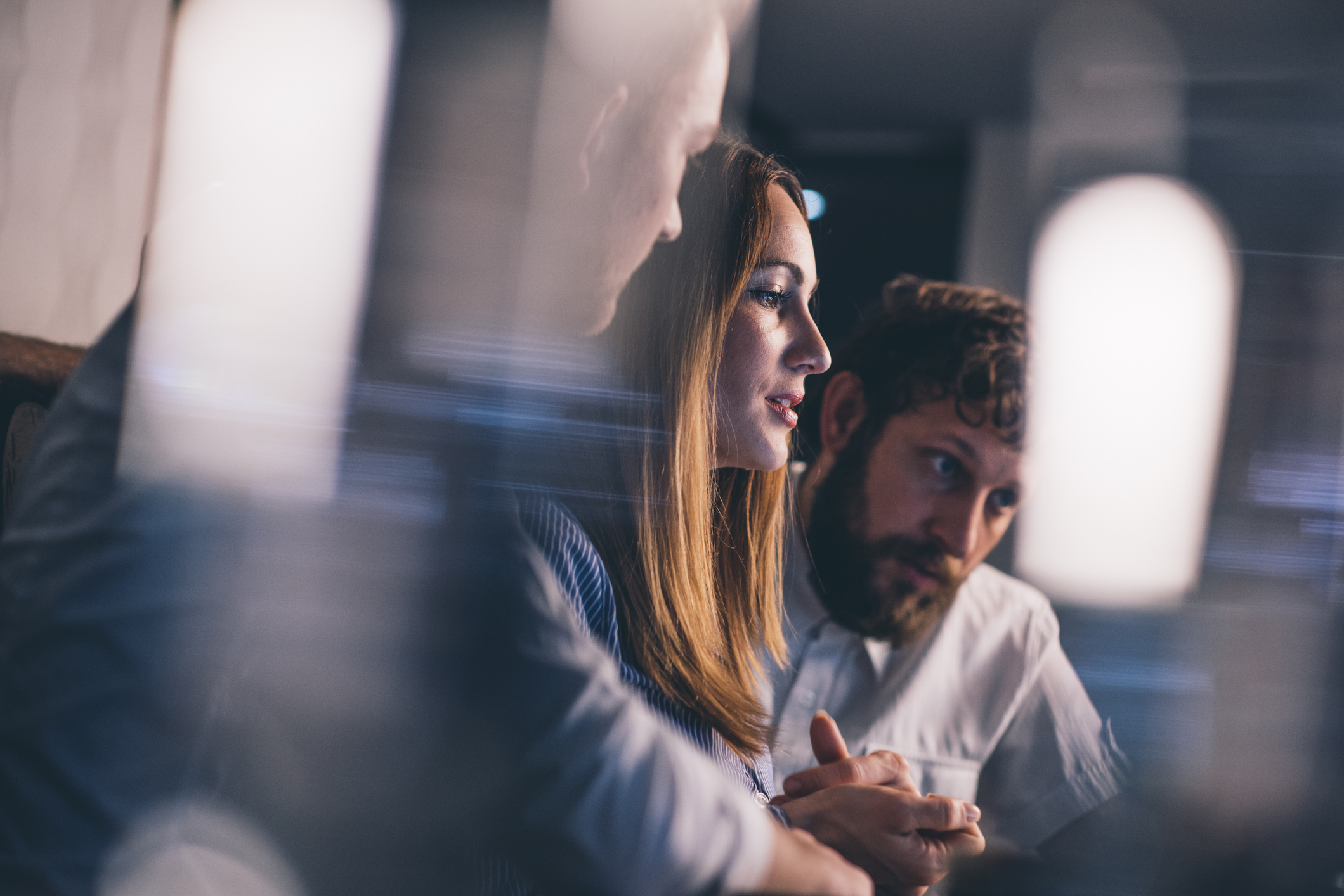 Businessmen and businesswoman working